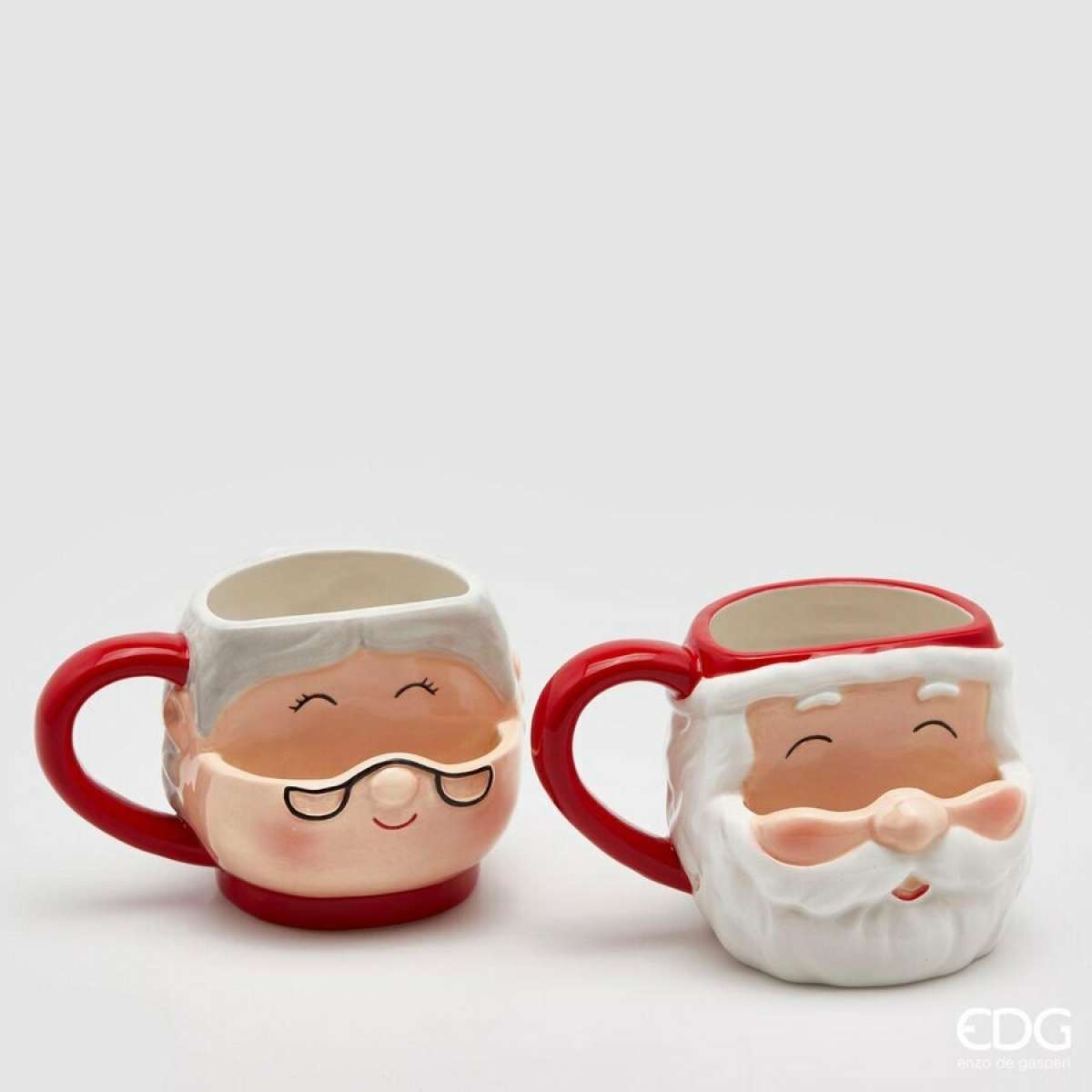 Immagine del prodotto Mug Babbo-Mamma Natale in ceramica con tasca x biscotti h10 cm | EDG Enzo De Gasperi